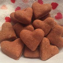 An image of heart-shaped Beet Dog Treats